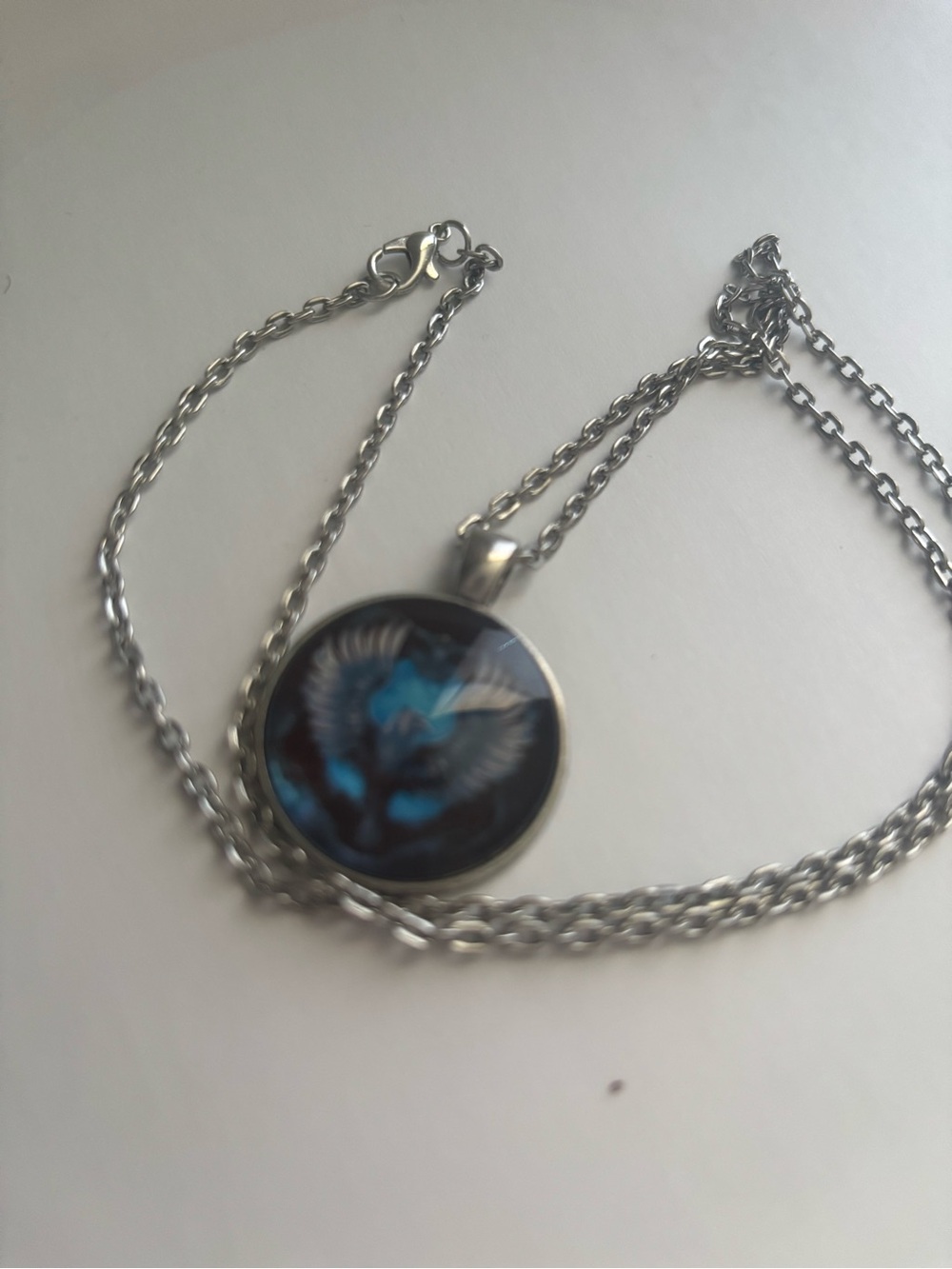 Silver Necklace Pendant with Blue Winged Eagle Design
